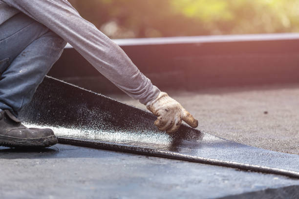 Professional Basement Waterproofing technician working in Hymera, IN